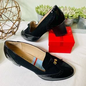 Black suede and patent leather dress shoe